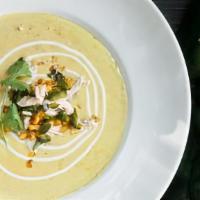 Chicken Poblano Soup · A wonderful blend of fresh chicken breast, seared poblanos and roasted corn in a light cream...