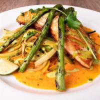 Red Pepper Salmon Filet · Pan seared fresh Norwegian salmon over julienne zucchini, squash, and carrots, served over a...