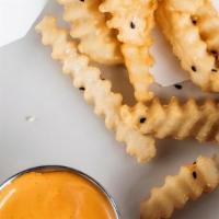Tokyo Crinkle Fries · Sesame oil scent, Sriracha mayo.