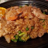 Fried Rice · Onion, pea-carrot, egg with your choice of chicken, pork, vegetable or tofu (steamed or frie...