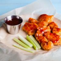 Hot-Garlic Bone-In Wings · Delicious traditional wings tossed in hot garlic sauce made to perfection and crisp.