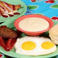 Egg-Stravaganza · Two eggs served with our chicken sausage, crisp bacon, creamy dreamy grits, plus whole wheat...