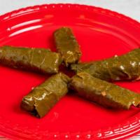 Grape Leaves (4 Pcs) · Grape leaves stuffed with rice and dill.