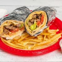 Beef Shawarma · With lettuce, tomatoes, onions and hummus sauce.