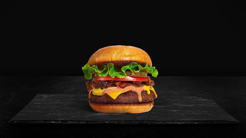 Classic Burger · American beef patty topped with lettuce, tomato, onion, and pickles. Served on a warm bun.