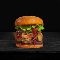 Spicy Bbq Burger · American beef patty topped with melted cheese, spicy barbecue sauce, lettuce, tomato, onion,...