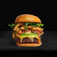 French Fries Burger · American beef patty topped with fries, avocado, caramelized onions, ketchup, lettuce, tomato...