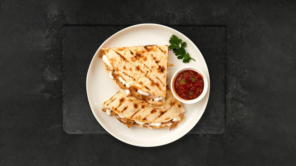 Smoked Sausage Quesadillas · Smoked sausage wrapped with yum yum sauce and cheese in a grilled tortilla.