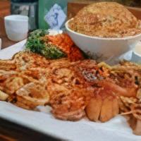 Sake Trio · Grilled shrimp, calamari, and ocean scallops. Served with miso soup or green salad, hibachi ...