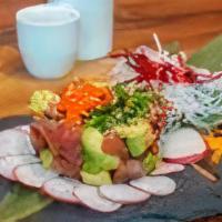 Tuna Tartar · Diced tuna and avocado mixed with a special spice sauce and sesame seeds.