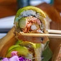 Dragon · Tempura shrimp, crab meats, asparagus, masago, and spicy mayonnaise topped with avocado and ...