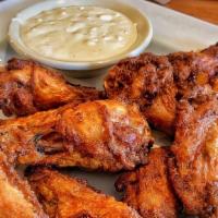 Flashback Wings · Ten chicken wings. Served with celery sticks and blue cheese or ranch dressing.