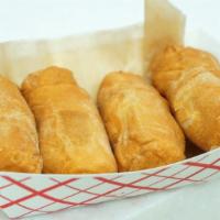 Mini Tequeños  · 4 mini fried bread dough sticks with queso blanco (fresh cheese) stuffed in the middle, serv...