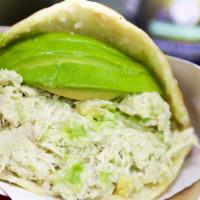 Reina Pepiada Arepa · Our gluten-free and corn-based flour cake, grilled and toasted to a savory perfection stuffe...