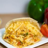 Arepa Catira · Our gluten-free and corn-based flour cake, grilled and toasted to a savory perfection stuffe...