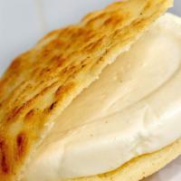 Cheese Arepa · Our gluten-free and corn-based flour cake, grilled and toasted to a savory perfection- stuff...