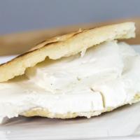 Guayanés Cheese Arepa · Our gluten-free and corn-based flour cake, grilled and toasted to a savory perfection- stuff...