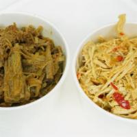 Shredded Chicken Or Beef (Pollo O Carne Mechada) 6 Oz, · All natural chicken or beef mixed with homemade sauce and sauteed onions, green and red pepp...