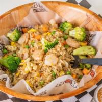 House Fried Rice (Large) · Veggie fried rice (fried egg, onions, pea & carrots, and broccoli) and chicken, beef, and sh...