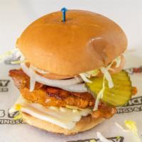Carolina Gold Chicken Sandwich · Fresh breaded chicken dipped in our Carolina Golden bbq sauce,  and Swiss cheese.