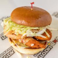 Buffalo Chicken Sandwich · Fresh breaded chicken tossed in our WNB hot sauce, drizzled with ranch dressing, topped with...