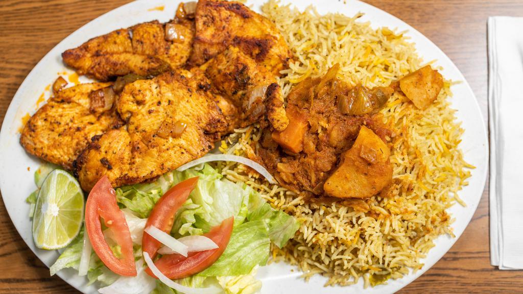 Chicken Steak · Grilled chicken breast cut into slices of fillet pieces marinated with lemon, onions, garlic, green pepper and tomatoes. Served with rice or spaghetti or injeera. Chapatti with salad and banana.
