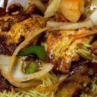 Chicken Suqaar Tibbs · Spicy - hot hot. Cubes of chicken breast sautéed with onions, special red pepper sauce, garl...