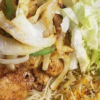 Rice & Chicken · Chicken breast cut into small pieces marinated with lemon, onions, garlic, green pepper and ...