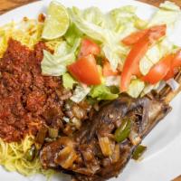 Lamb Shank · Lamb meat is sautéed with onions, garlic, green pepper and tomatoes. And mix of our special ...