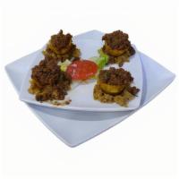 Plantain Stuffed With Ground Beef · Tostones Rellenos de Picadillo 
(4 por orden)