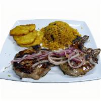 Pork Chops · 2 Juicy Grilled Pork Chops with onions