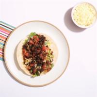 Al Pastor Taco Taco (3) · Al pastor, pico de gallo, chopped lettuce, cilantro, and salsa on a corn tortilla.