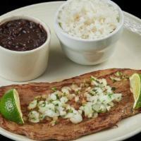 Palomilla Steak · Flat iron grilled thin steak+parsley+onions