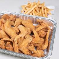 Large Family Pack  · 20 Whole Wings, Twelve catfish, box of fries, bread, Large coleslaw.