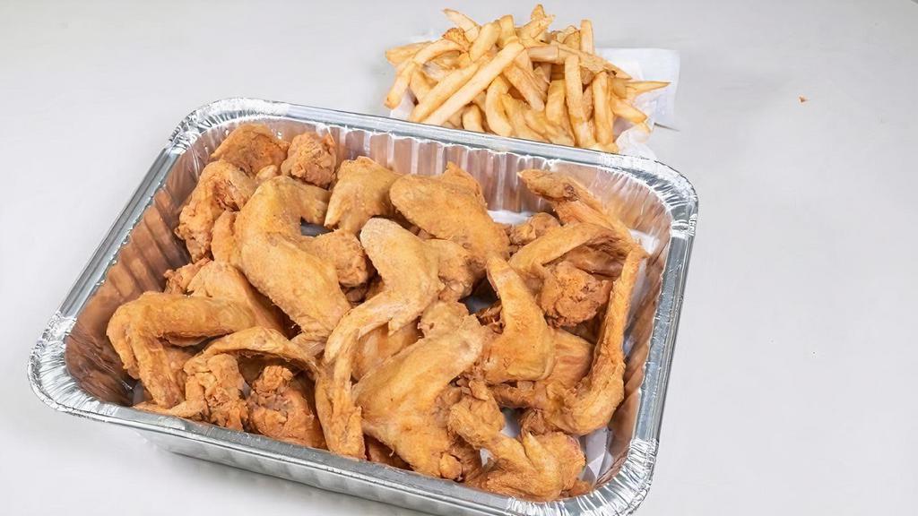 Large Family Pack  · 20 Whole Wings, Twelve catfish, box of fries, bread, Large coleslaw.