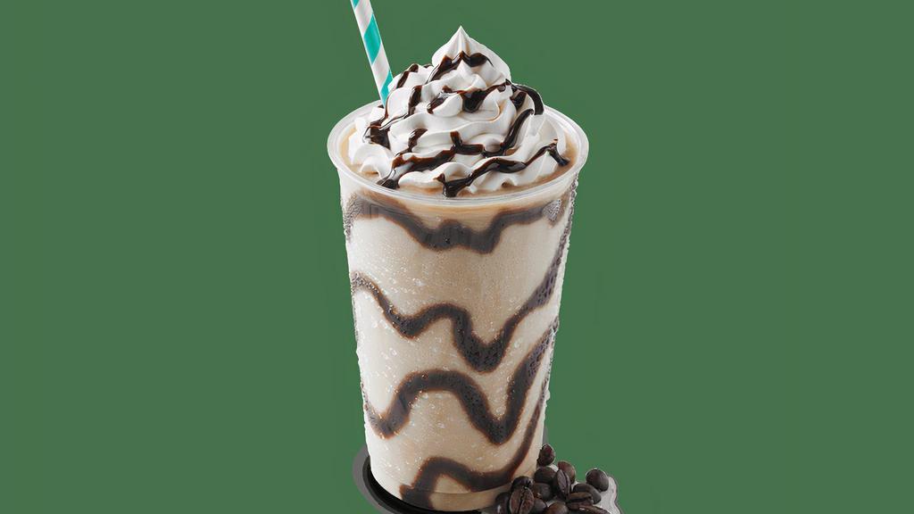 Coffee Shake · Hershey’s® chocolate swirl, Sweet Cream Ice Cream and coffee mixture topped with whipped cream and Hershey’s® chocolate syrup.