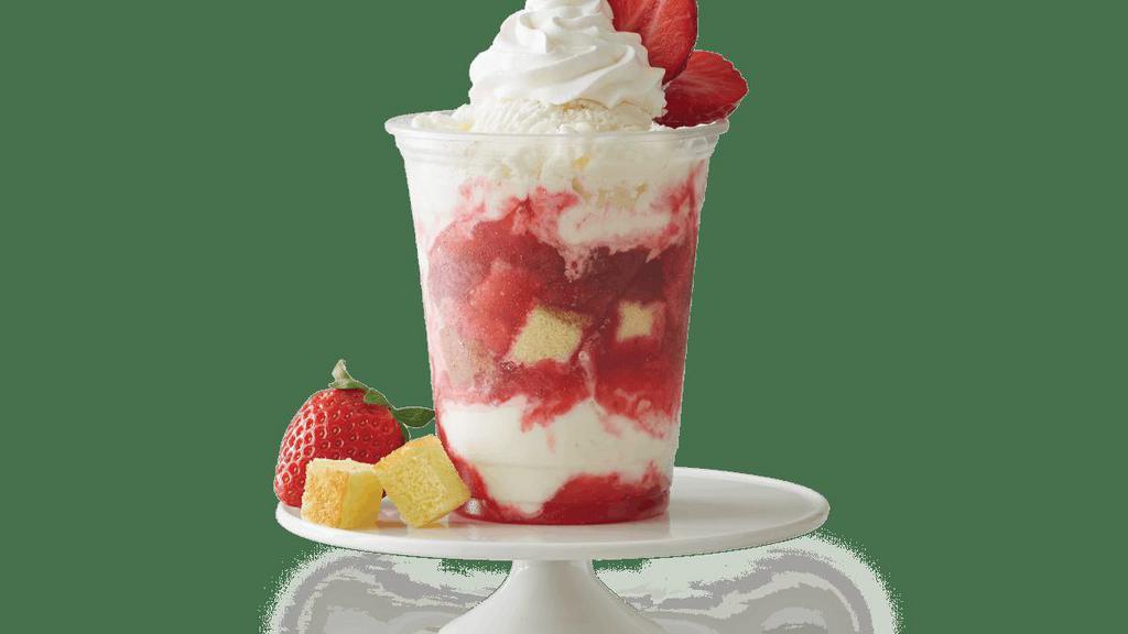 Strawberry Short Cake Sundae · Sweet Cream Ice Cream, yellow cake pieces, and strawberry syrup, topped with whipped cream and fresh strawberries.