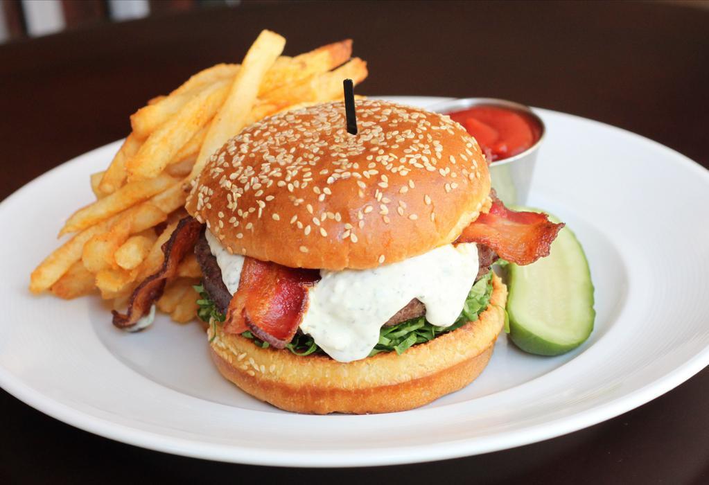 Black And Blue Burger · Gorgonzola, apple-wood smoked bacon, toasted sesame brioche roll.