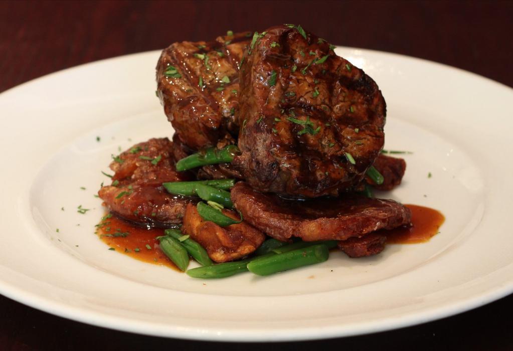 Grilled Center Cut Filet · Crispy Smashed Red B Potato, Tiny Green Beans,
Red Wine Demi Reduction.