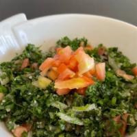 Tabbouli · Finely chopped lettuce, tomatoes, parsley, mint, bulgur and onion. Seasoned with a house dre...