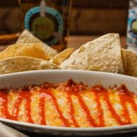 Cheesy Buffalo Chicken Dip · Seasoned diced chicken, smothered with our delicious Mild Buffalo sauce, homemade buttermilk...
