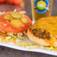 Classic Burger · Premium 8oz steak burger topped with cheddar cheese, lettuce, tomato and pickle slices.
