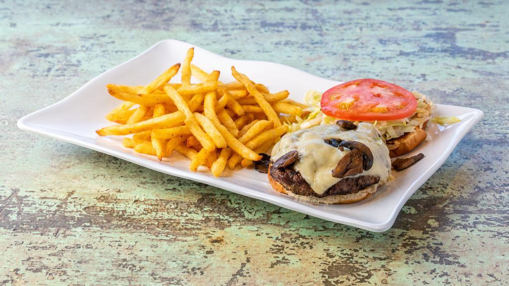 The Trippy Hippy Burger · A half-pound steak burger smothered with sautéed mushrooms and melted Swiss cheese, topped with lettuce, tomato and mayo.