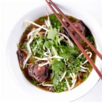 Meatball Pho · House-made, slow simmered, clear beef broth flavored with star anise, cinnamon, cloves, cori...