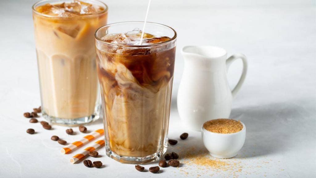 Vietnamese Iced Coffee · Strong, dark roast coffee, slow dripped and sweetened with condensed milk over ice.