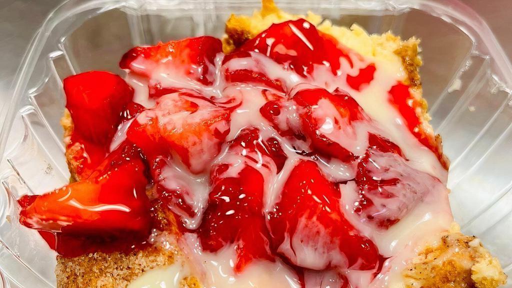 Strawberry Churro Cheesecake · Yummy churro cheesecake topped with fresh strawberries and LaLechera.