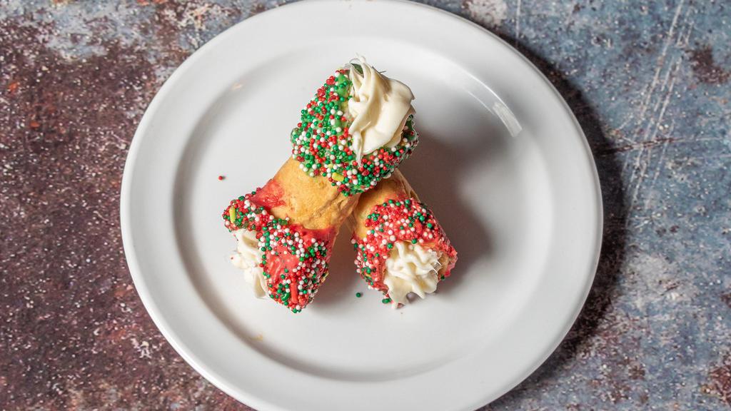 Cheesecaked Cannoli · Cannoli stuffed with our signature no bake cheesecake and finished with a yummy treat.