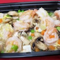 Shrimp With Lobster Sauce · Garlic white wine sauce with mushrooms, onions, peas, carrots, and egg.