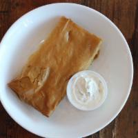 Appetizer Spinach Pie · Vegetarian. Flaky phyllo dough stuffed with a mixture of spinach and feta cheese. Served wit...