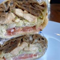 Olympian Pita · Chicken and gyro combined in one pita. Lettuce, tomatoes, onions and tzatziki. 893 cal.